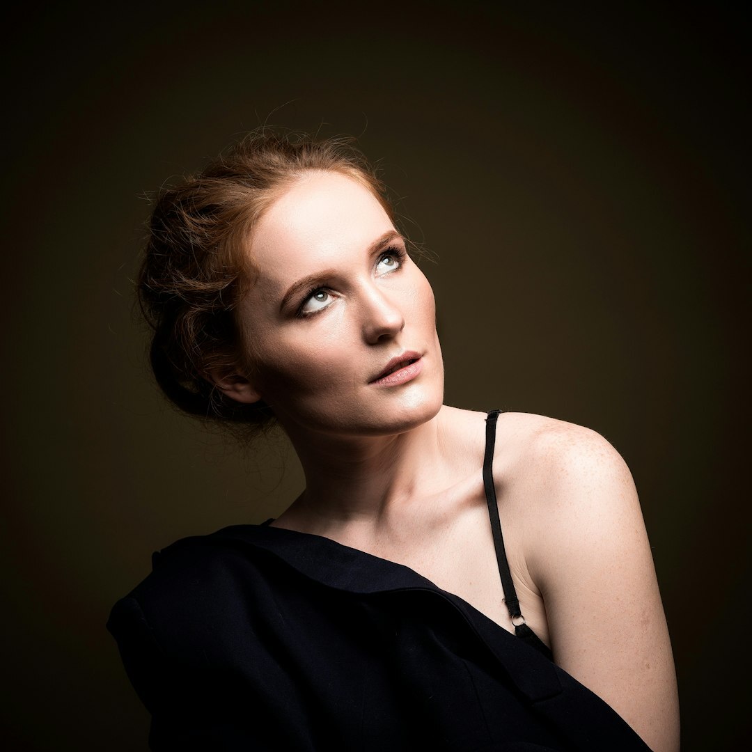 Belgian woman newsroom management trainer studio portrait