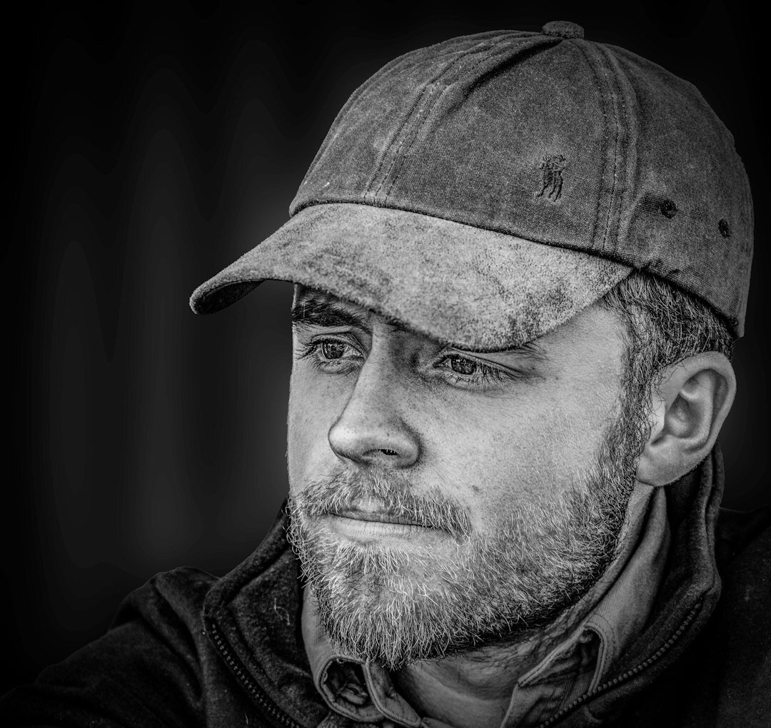 Belgian man live broadcast technical trainer studio portrait