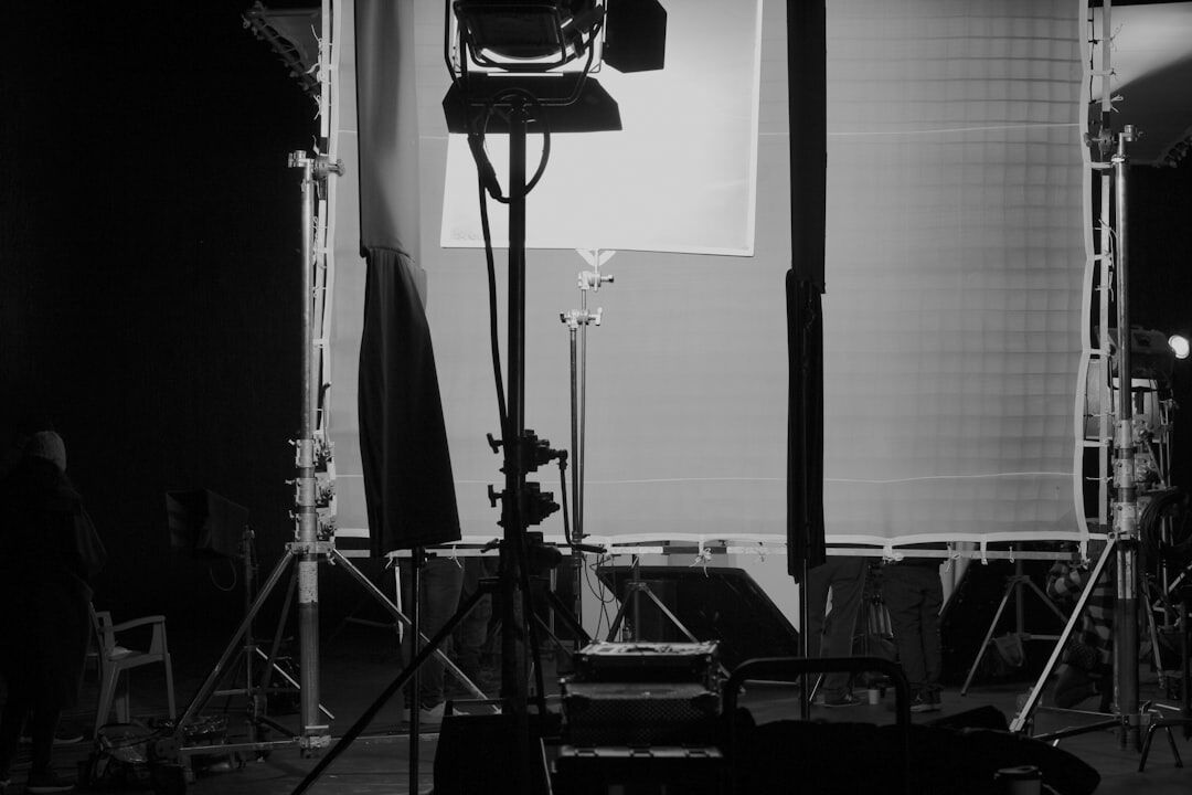 Television live broadcast studio with cameras and lighting rigs