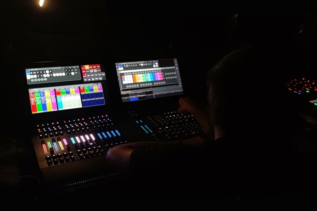 Broadcast control room with multiple live monitors and editors