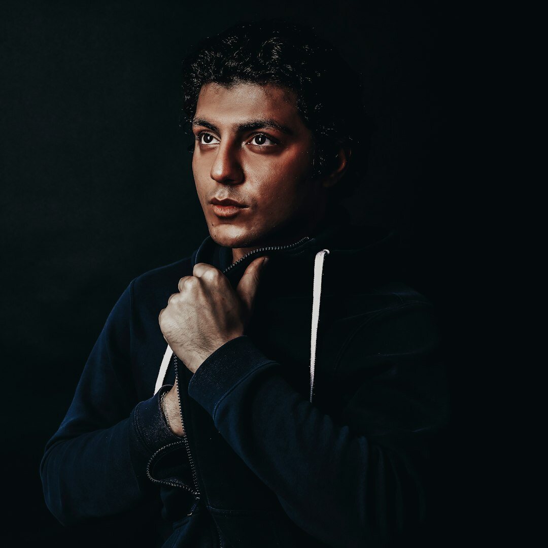 Belgian man editorial coordination trainer in a studio portrait